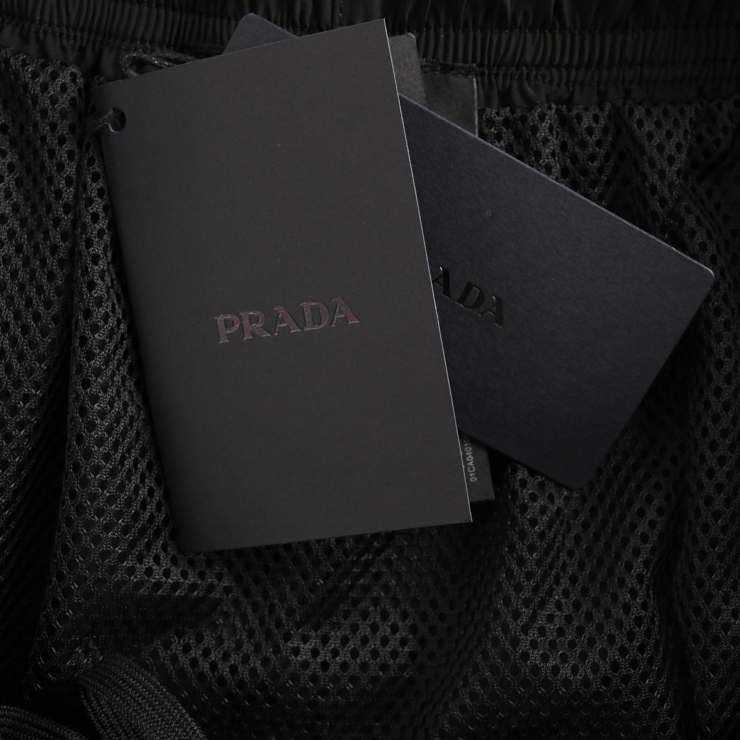 Prada 25ss waist triangle logo beach shorts