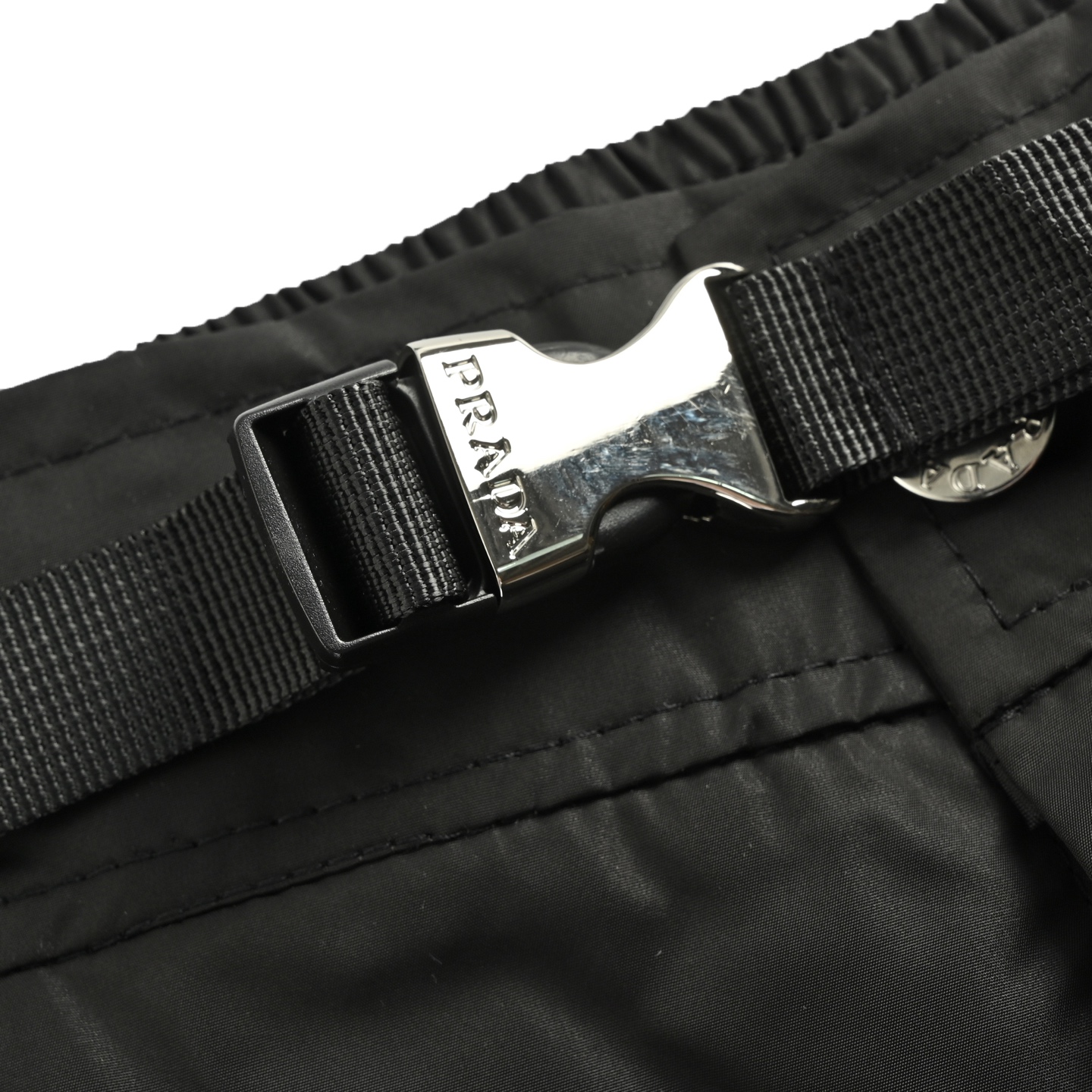 Prada 25ss triangle logo zip pocket nylon shorts