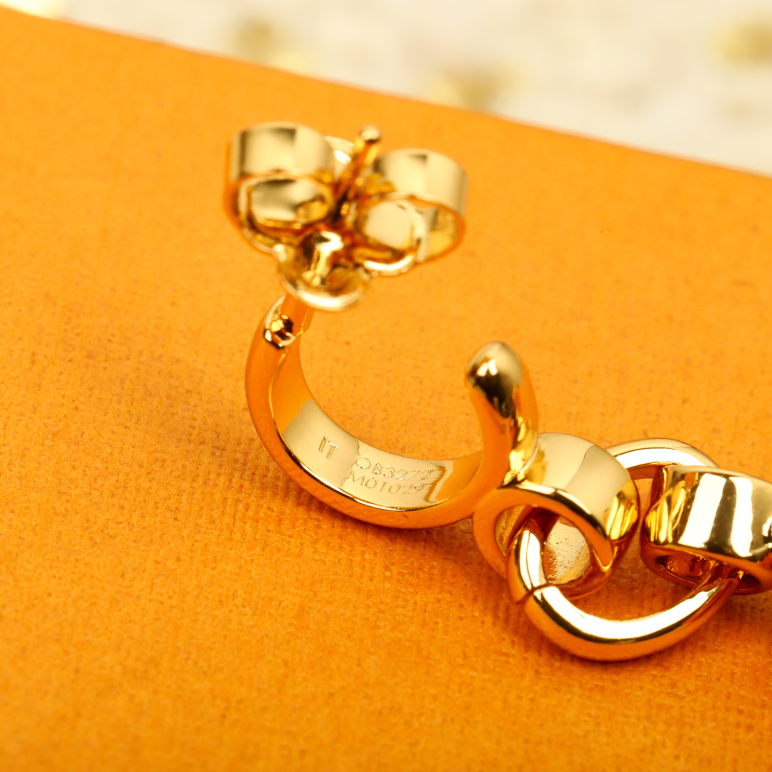 Louis Vuitton four leaf clover earrings