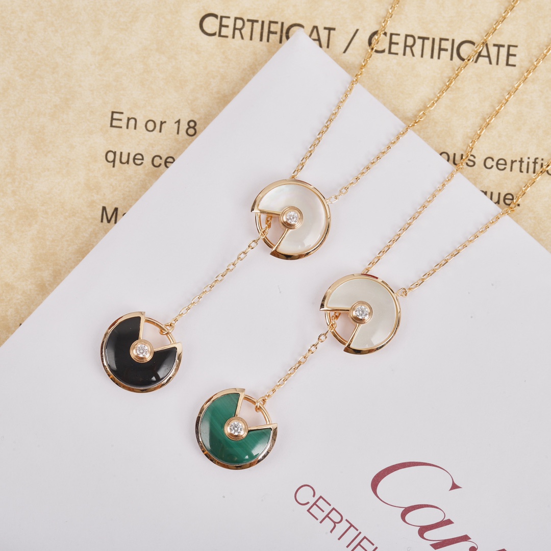 Cartier long chain amulet necklace