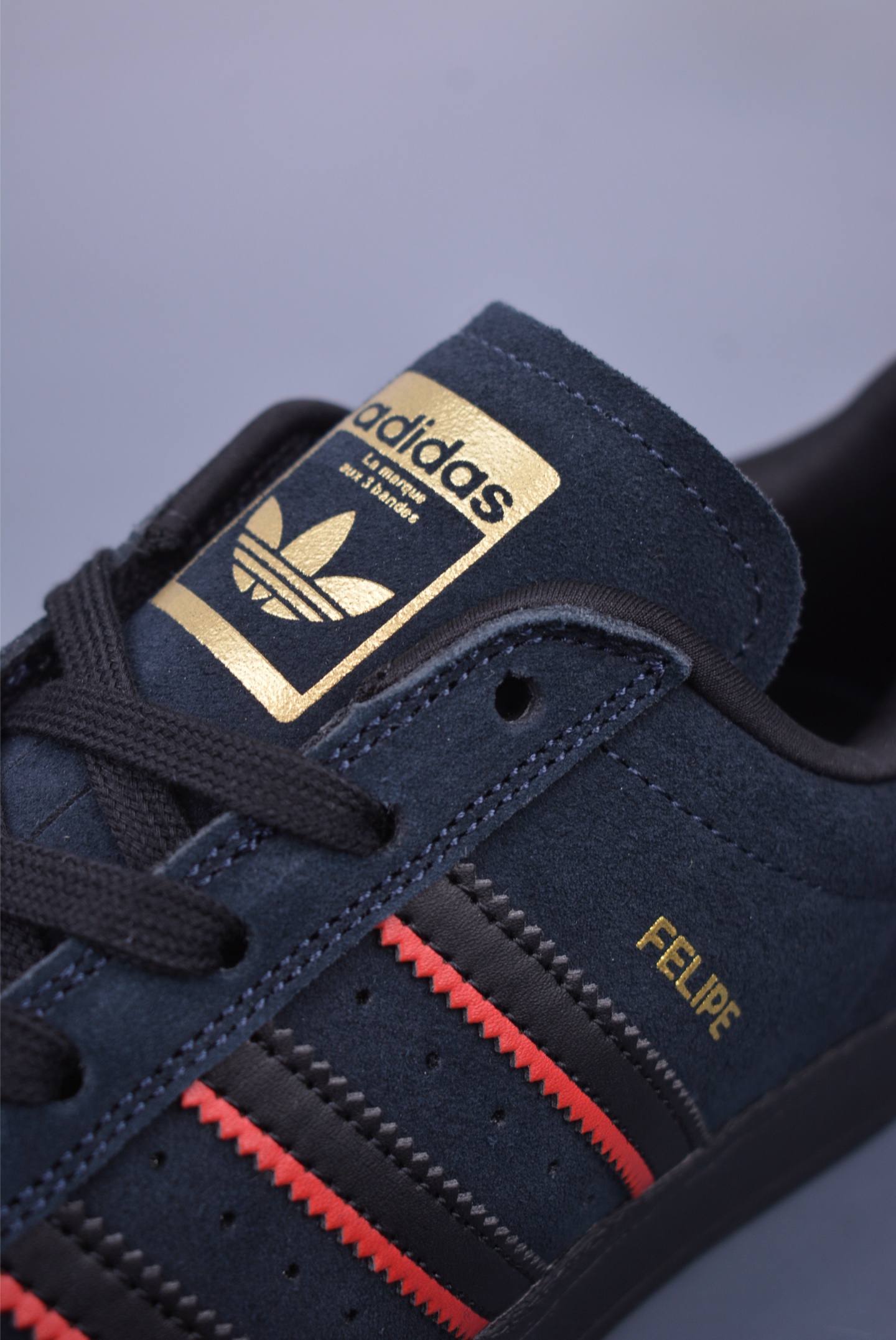 Felipe Gustavo x Adidas Superstar ADV sports shoes black, red and gold JR7831