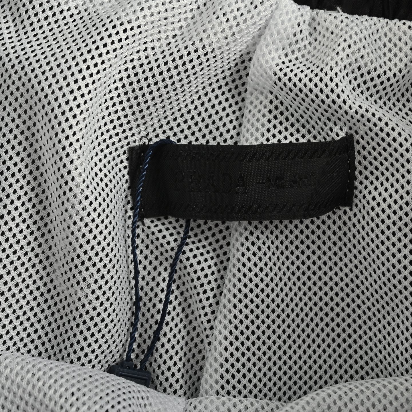 Prada 25ss all-over logo beach shorts