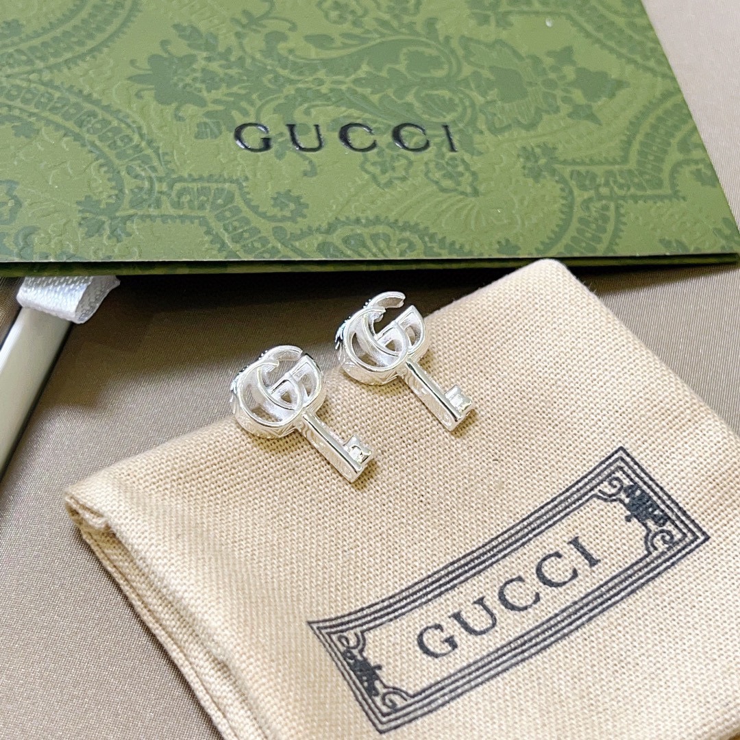 GUCCi key earrings
