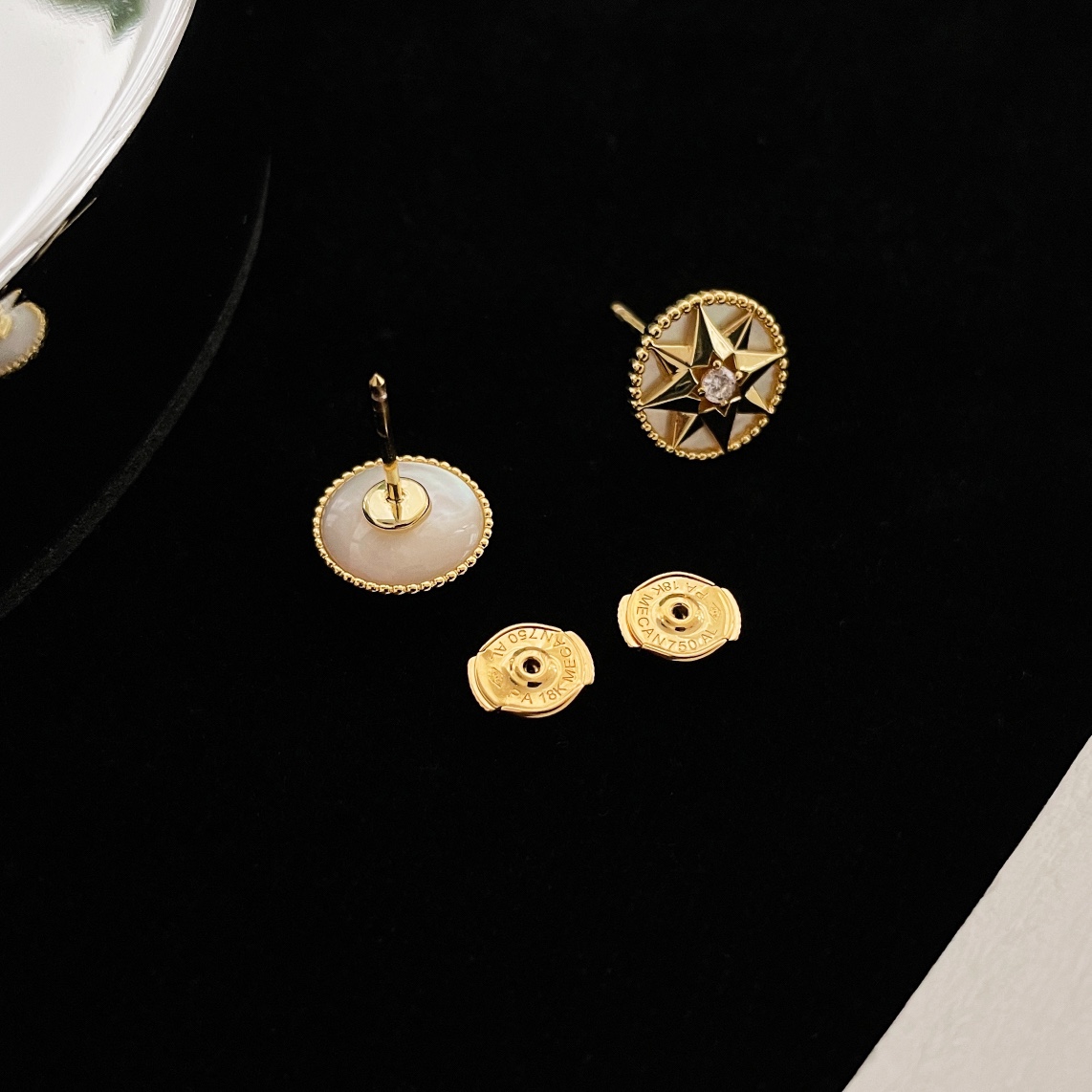 Dior eight-pointed star compass earrings