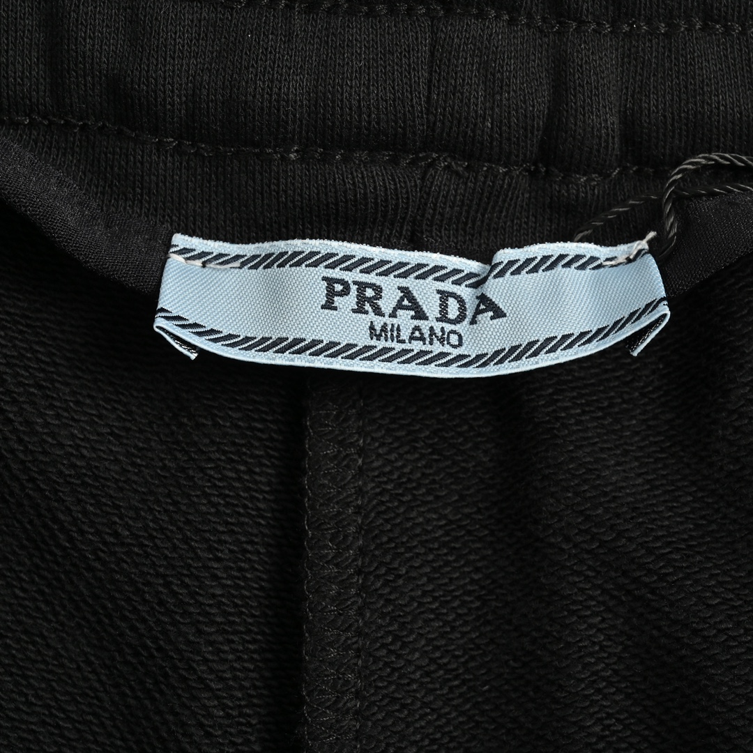 Prada triangle logo taped pocket trousers