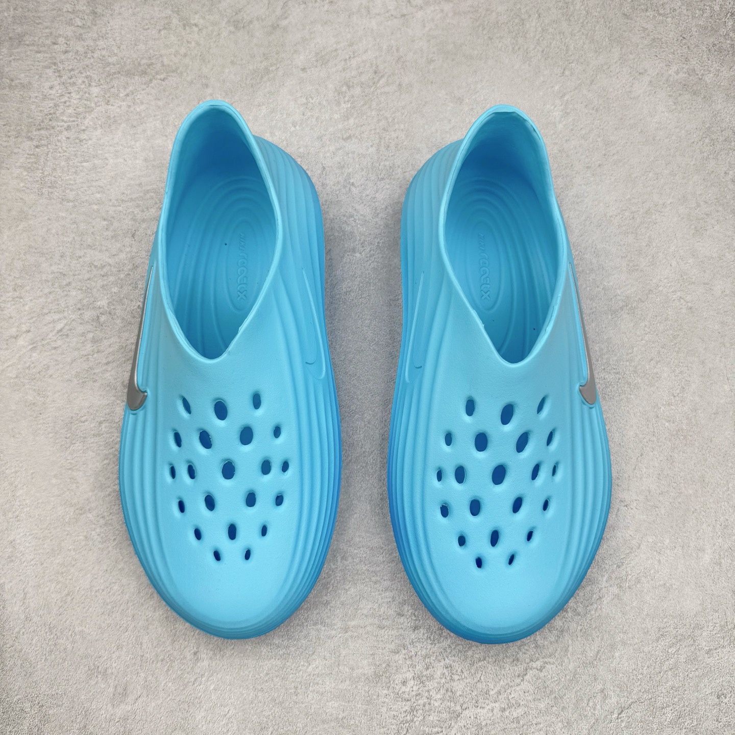 Nike ReactX Rejuven8 Simple, Comfortable and Versatile Hole Shoes