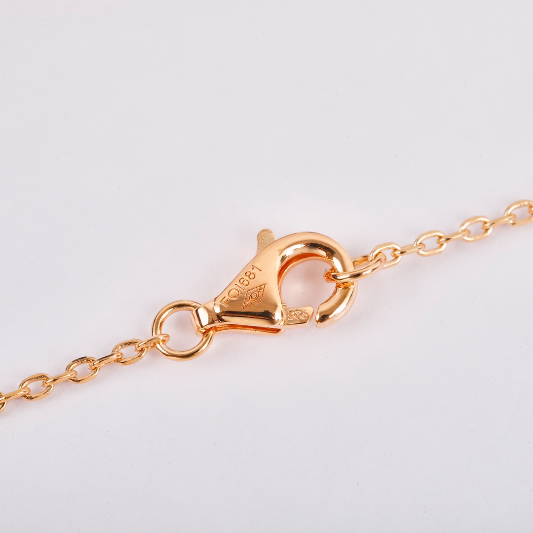 Cartier long chain amulet necklace
