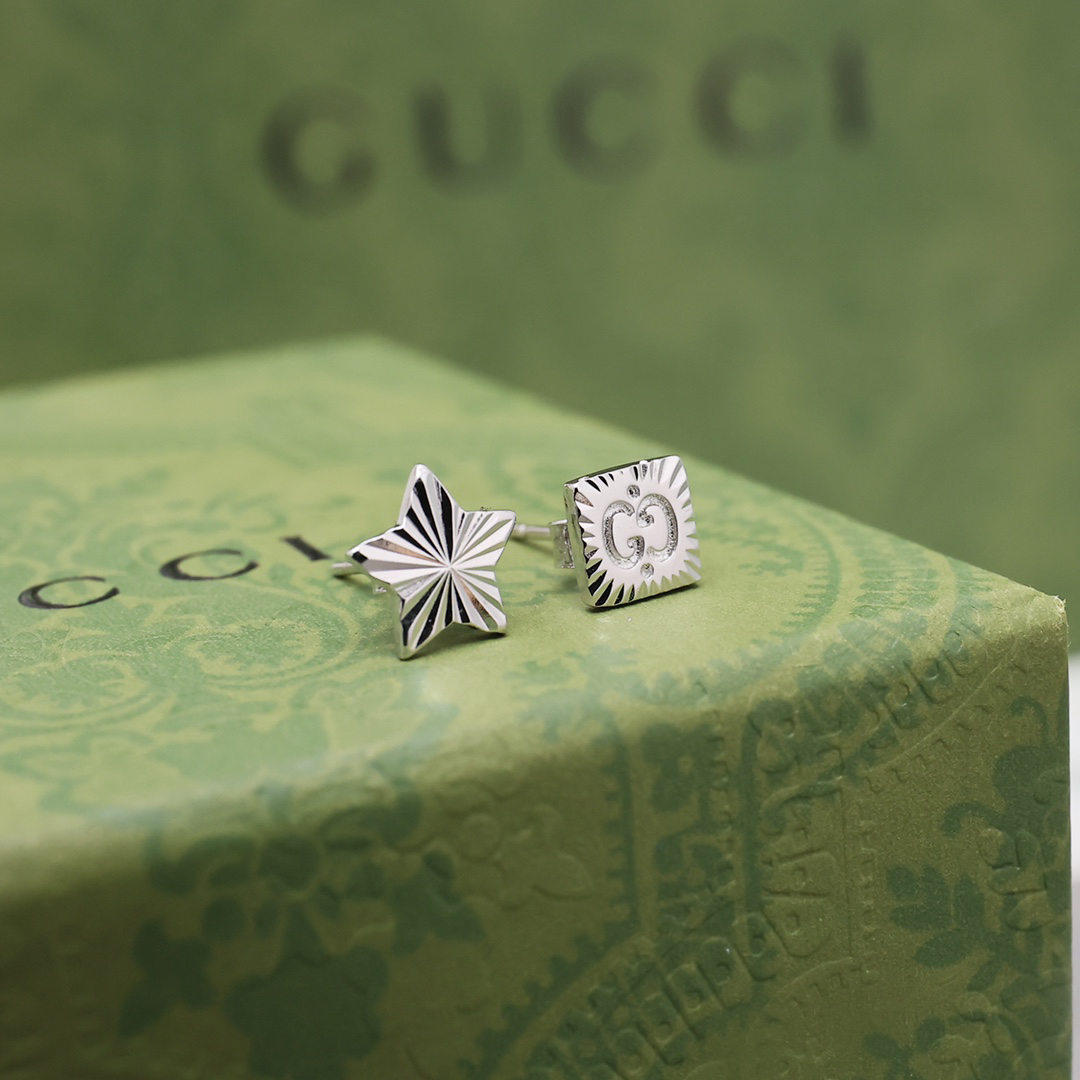 GUCCi five-pointed star earrings