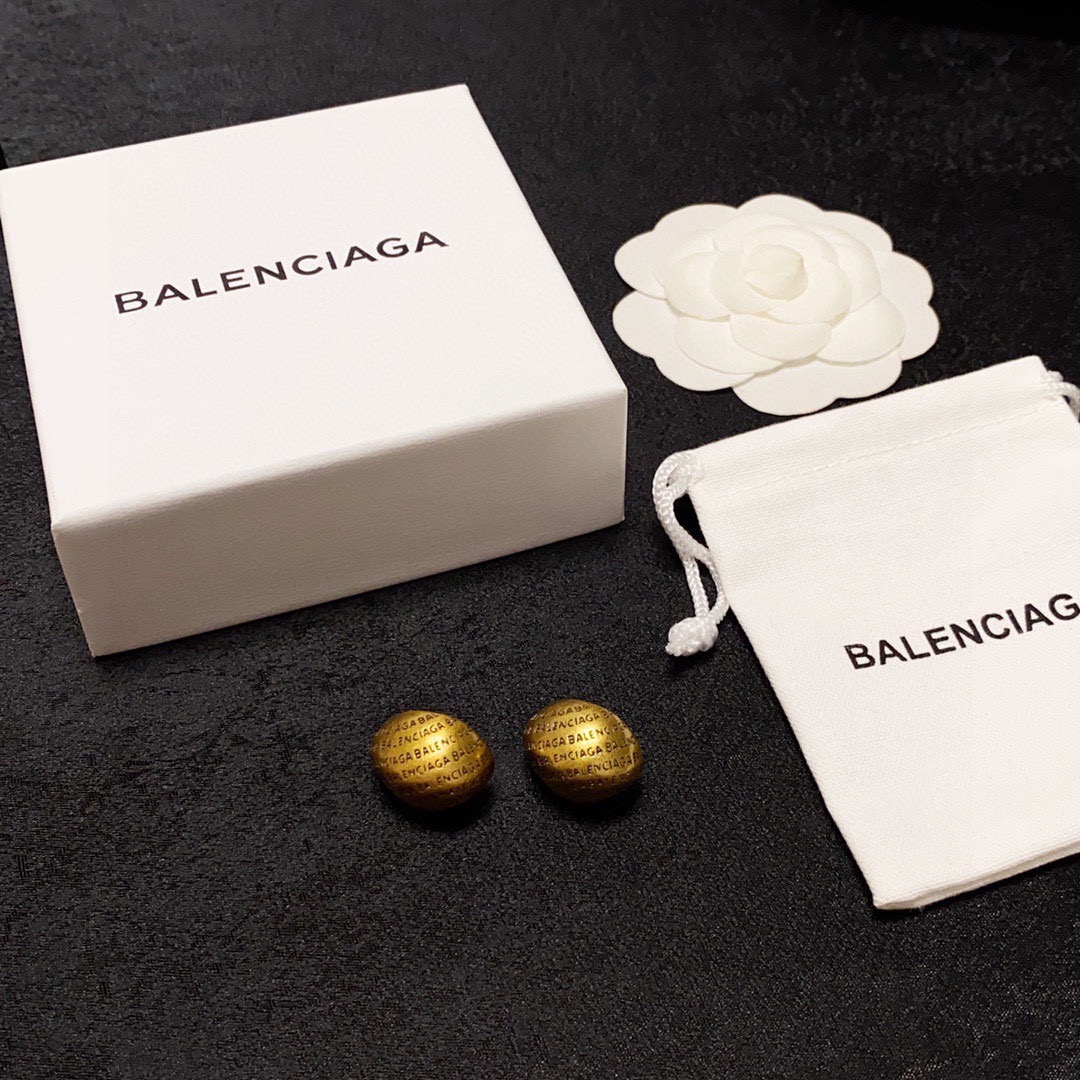 Balenciaga antique gold engraved letter earrings