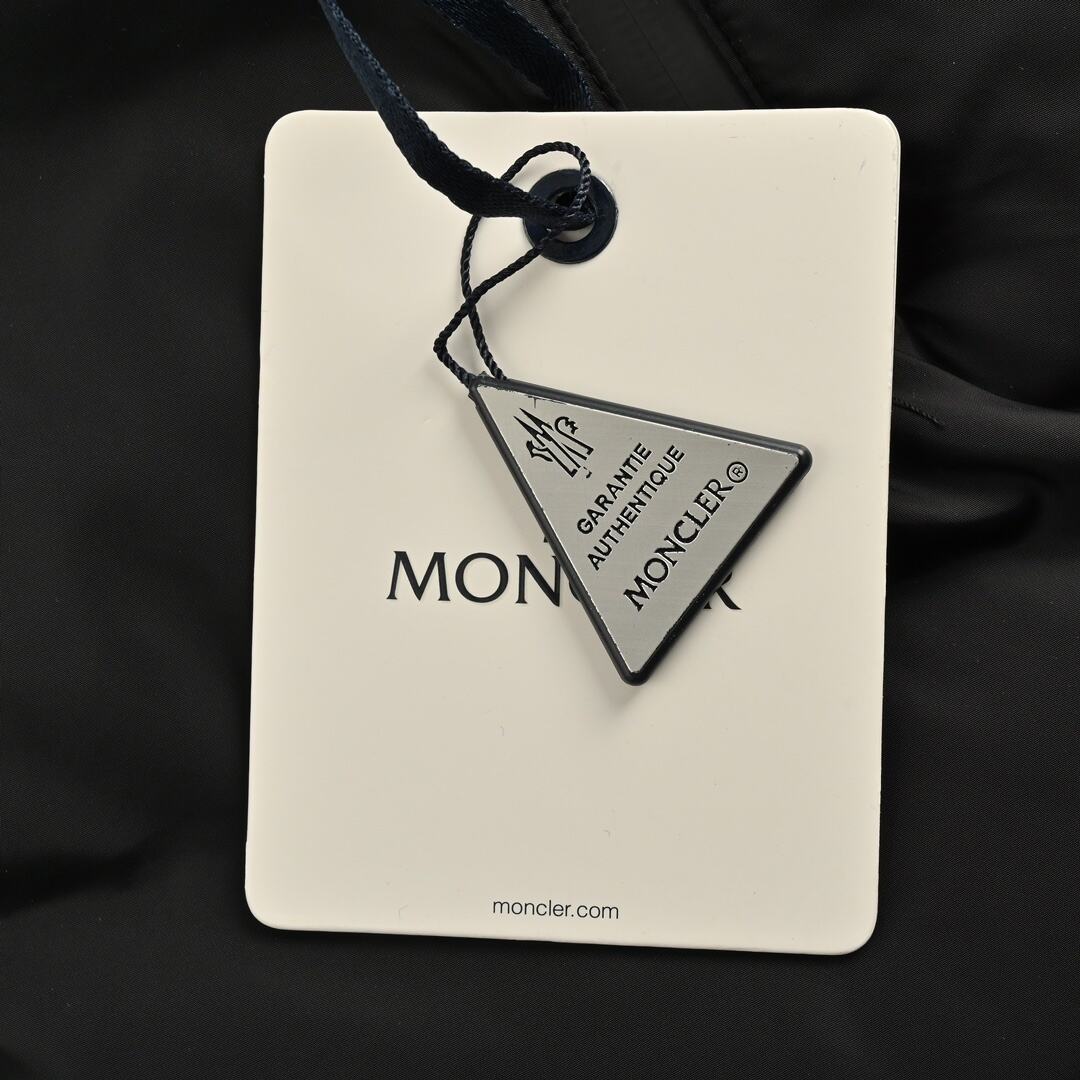 Moncler down jacket with embroidered logo on the lining