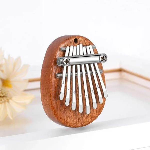 (🔥HOT SALE NOW - SAVE 50% OFF)  8 Keys Mini Kalimba Thumb Piano -BUY 3 FREE SHIPPING