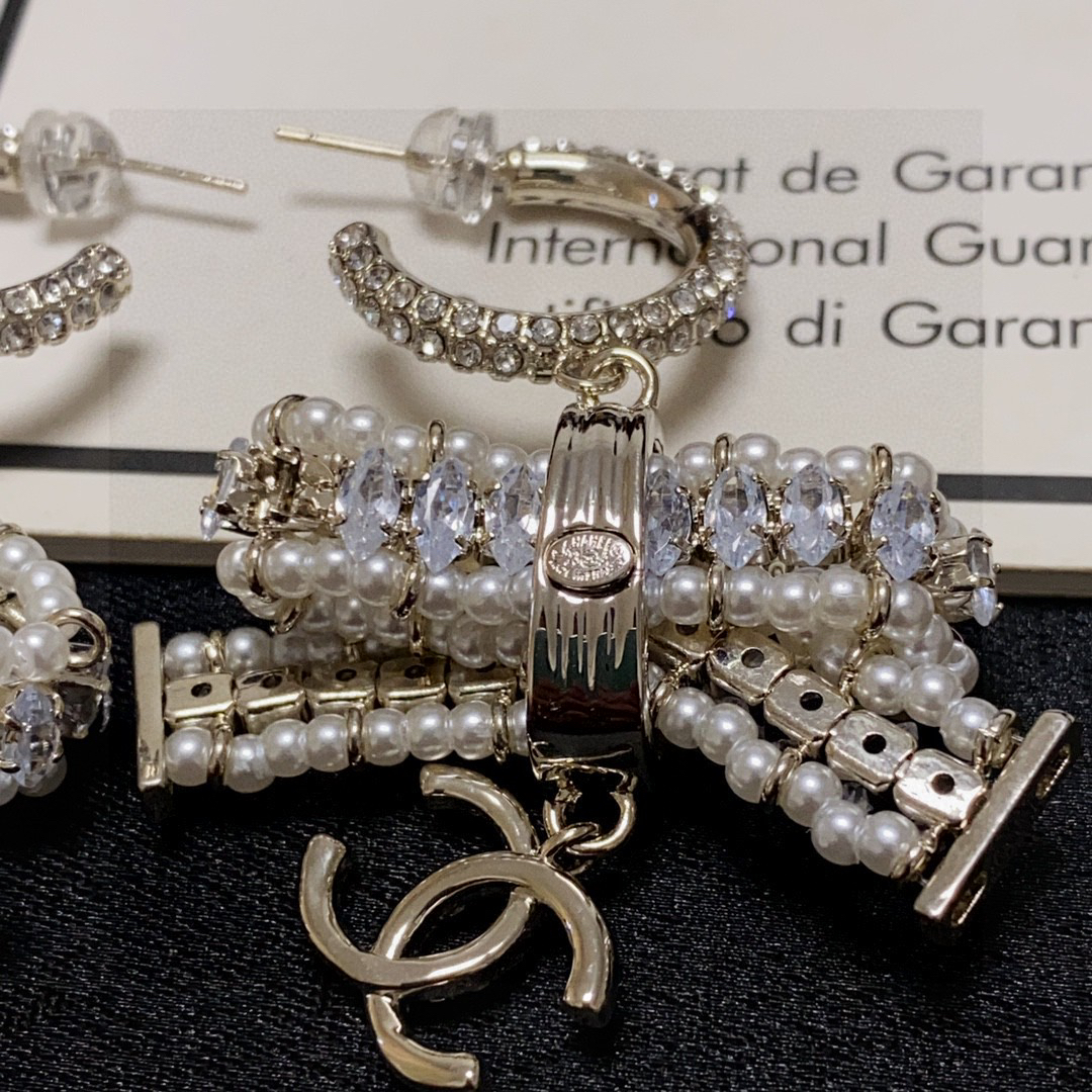 Chanel full diamond pearl bow earrings