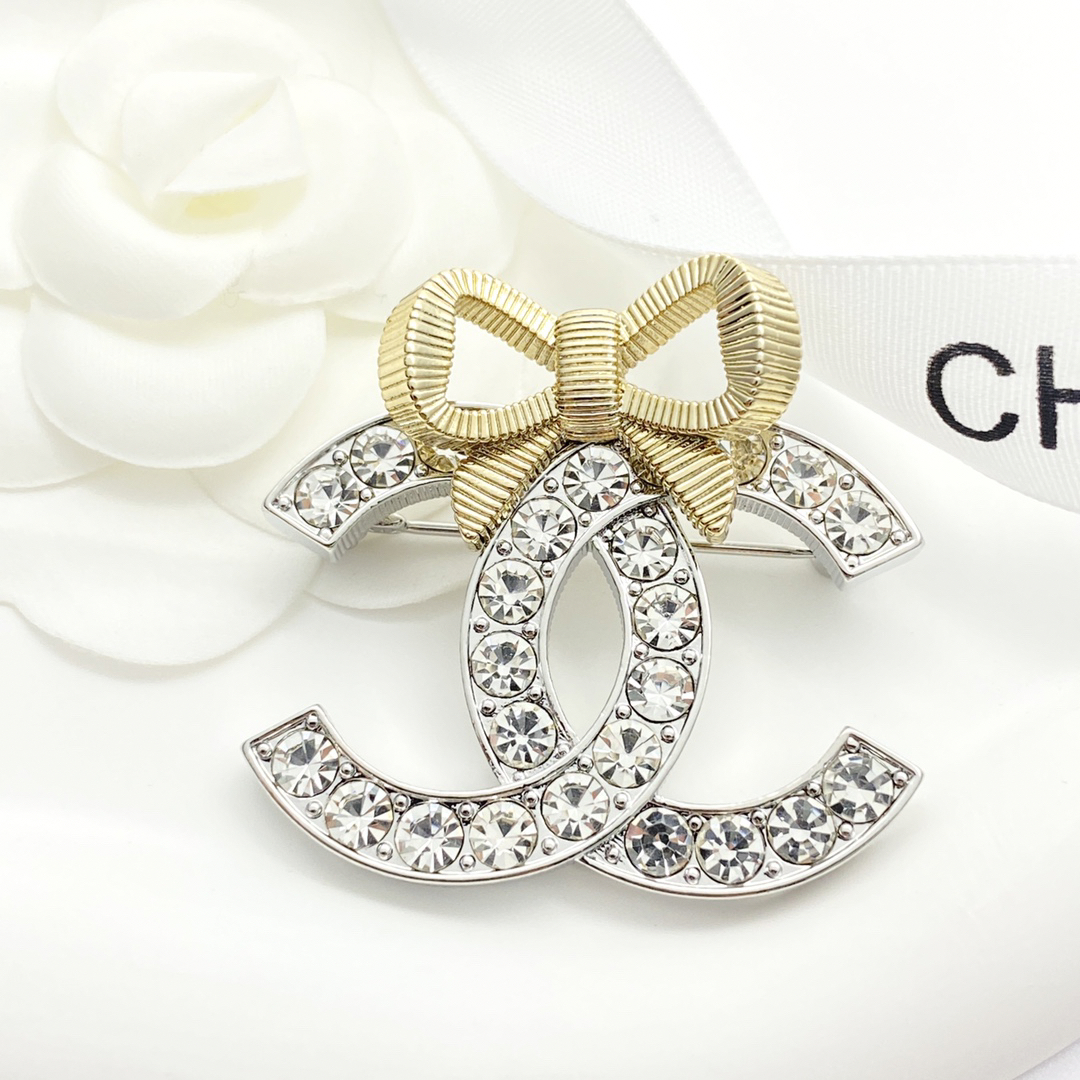 CHAN 24 gold and silver three-dimensional bow brooch