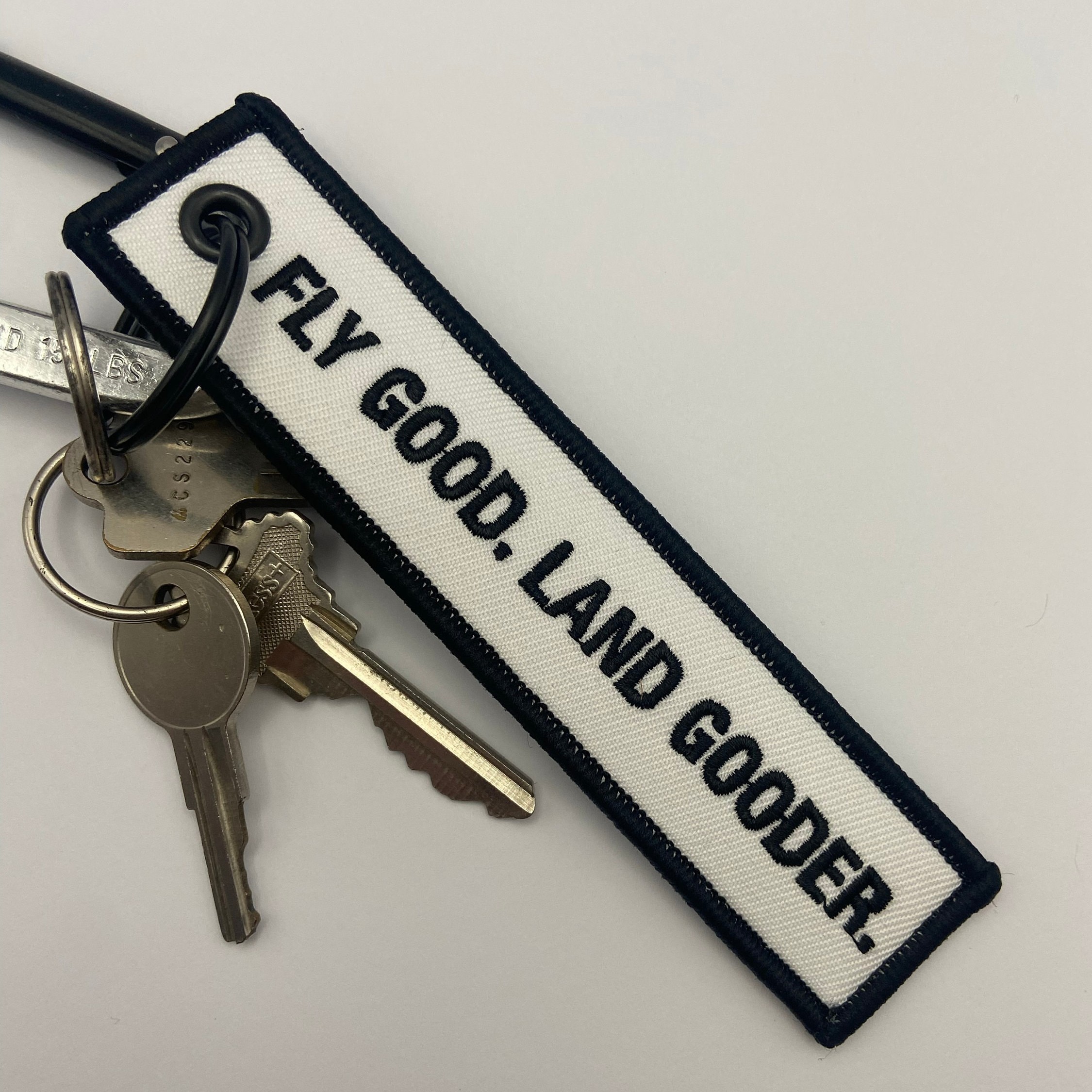 Fly Good. Land Gooder. Keychain | Aviation Humor