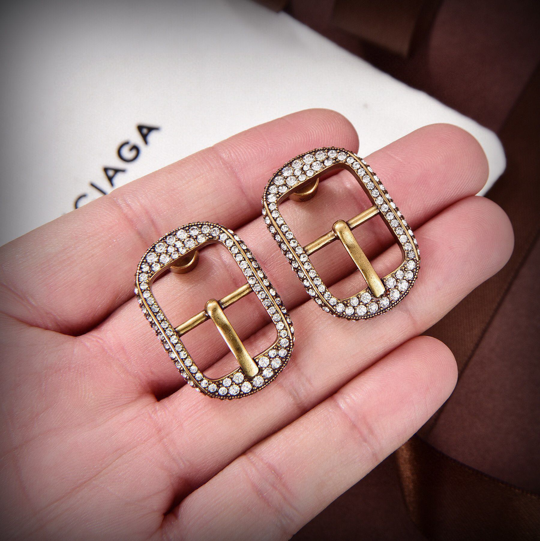 Balenciaga belt buckle diamond earrings