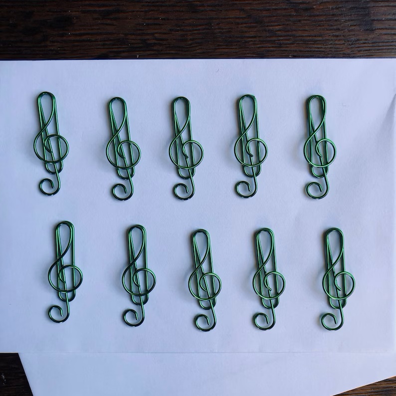 A set of 10 high quality music treble clef colored metal paper clips