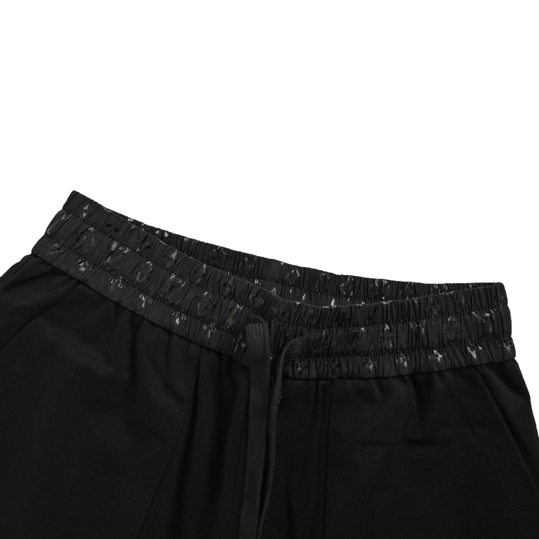 Louis Vuitton catwalk trousers with embroidered logo