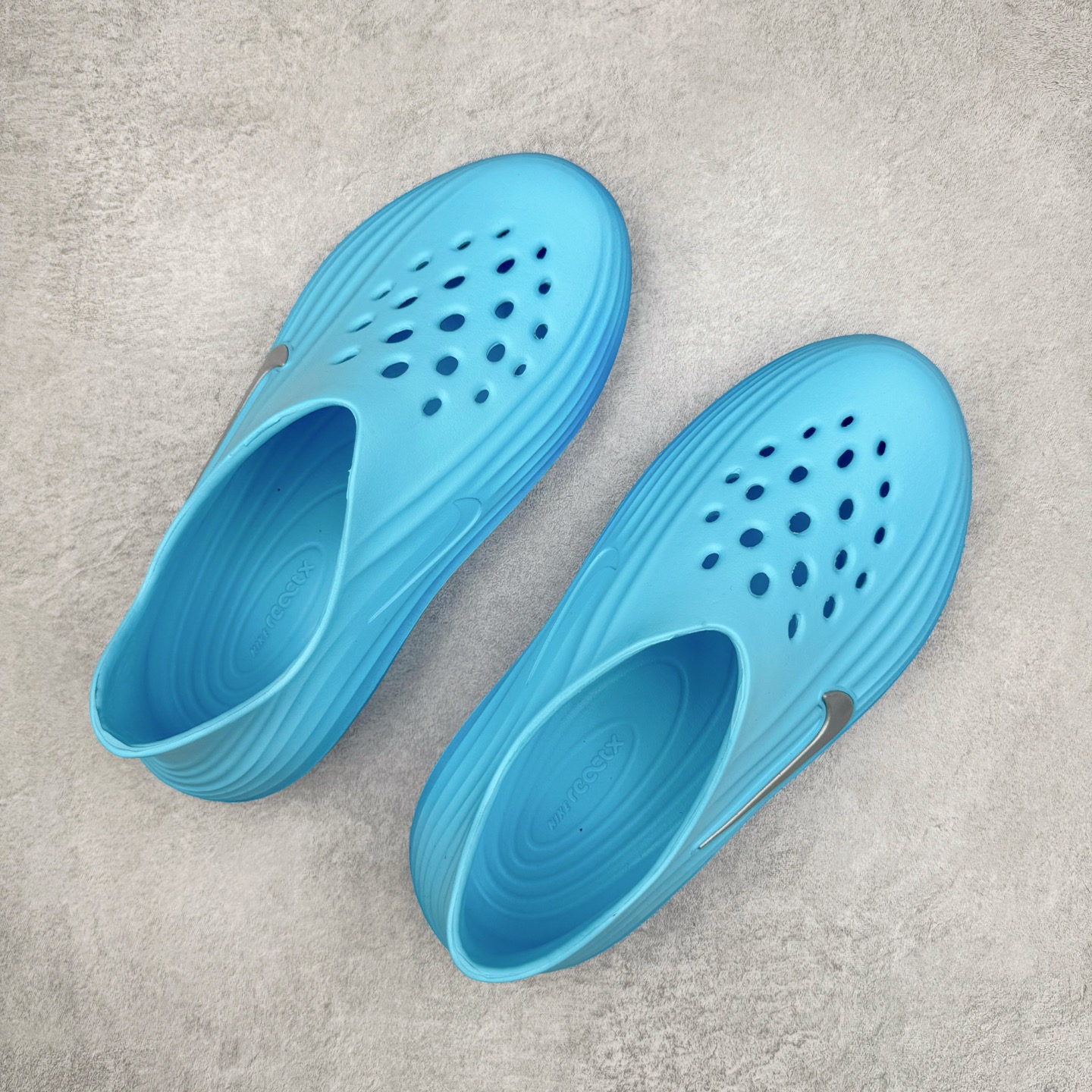 Nike ReactX Rejuven8 Simple, Comfortable and Versatile Hole Shoes