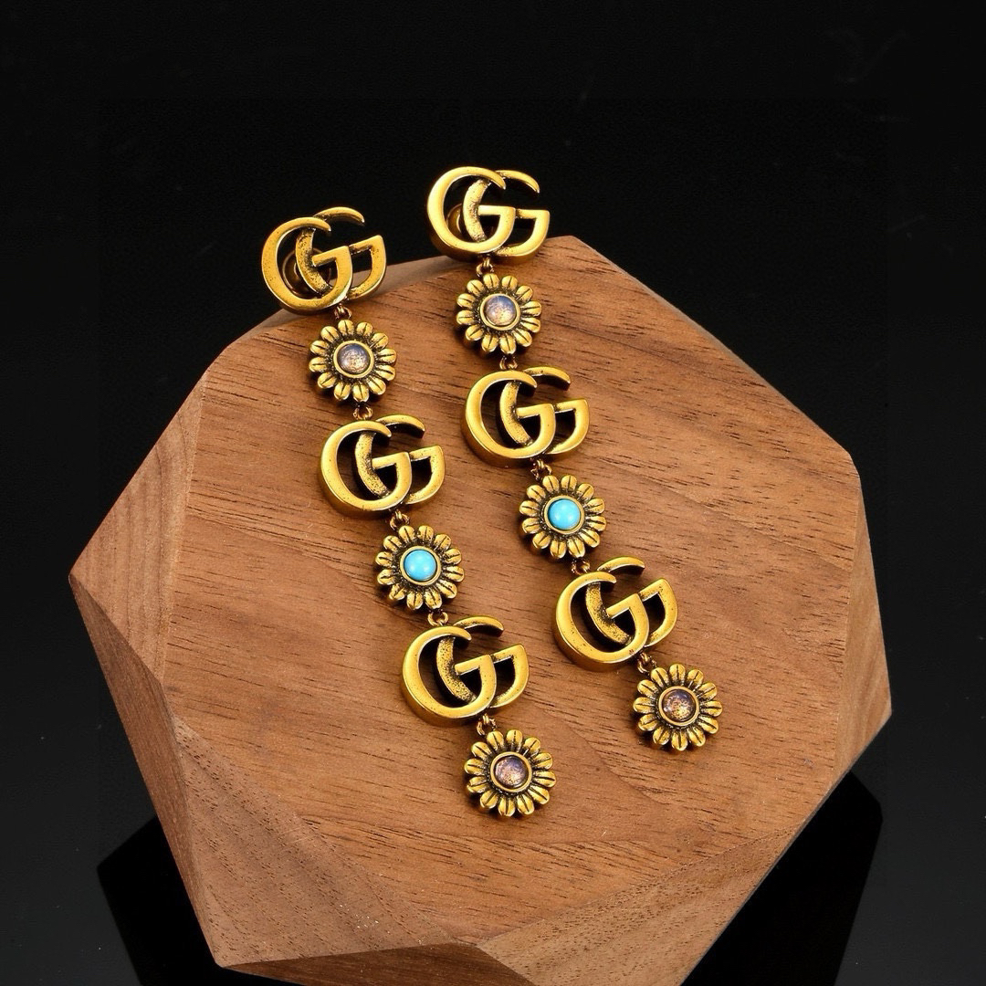 GUCCi distressed chrysanthemum earrings