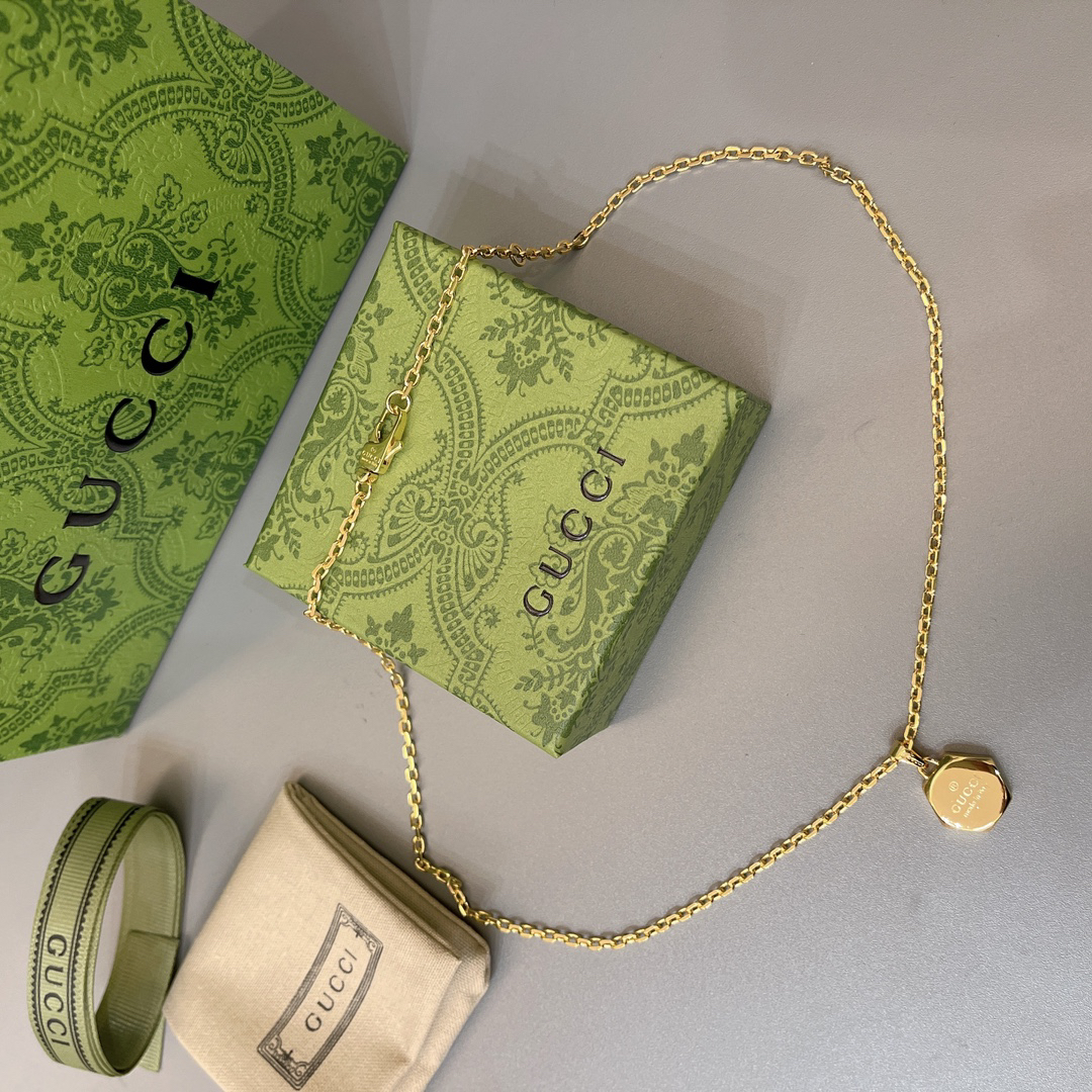 Gucci gold nut necklace