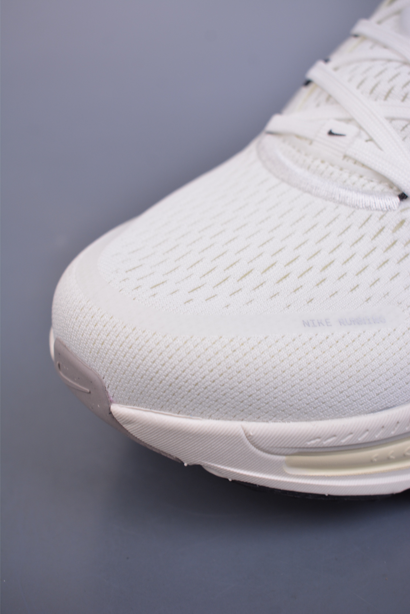 Nike Vomero 18 ZoomX running shoes off-white and black hook HM6803-101