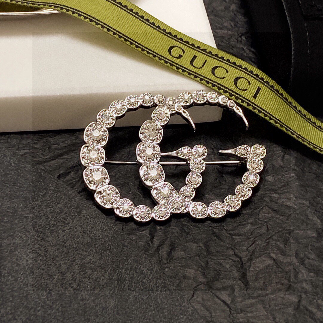 Gucci GG diamond brooch