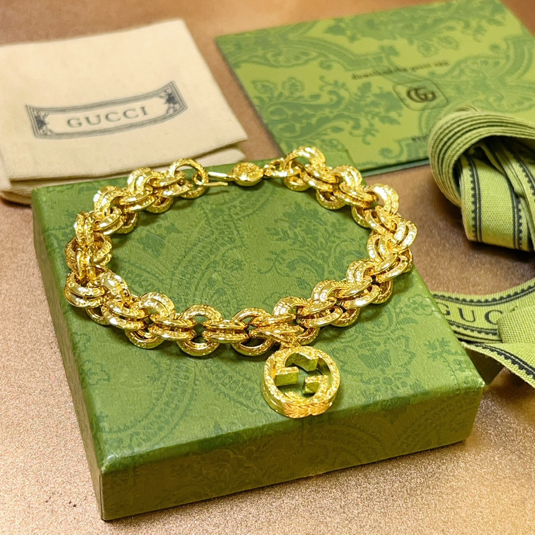 Gucci GG round double ring gold bracelet