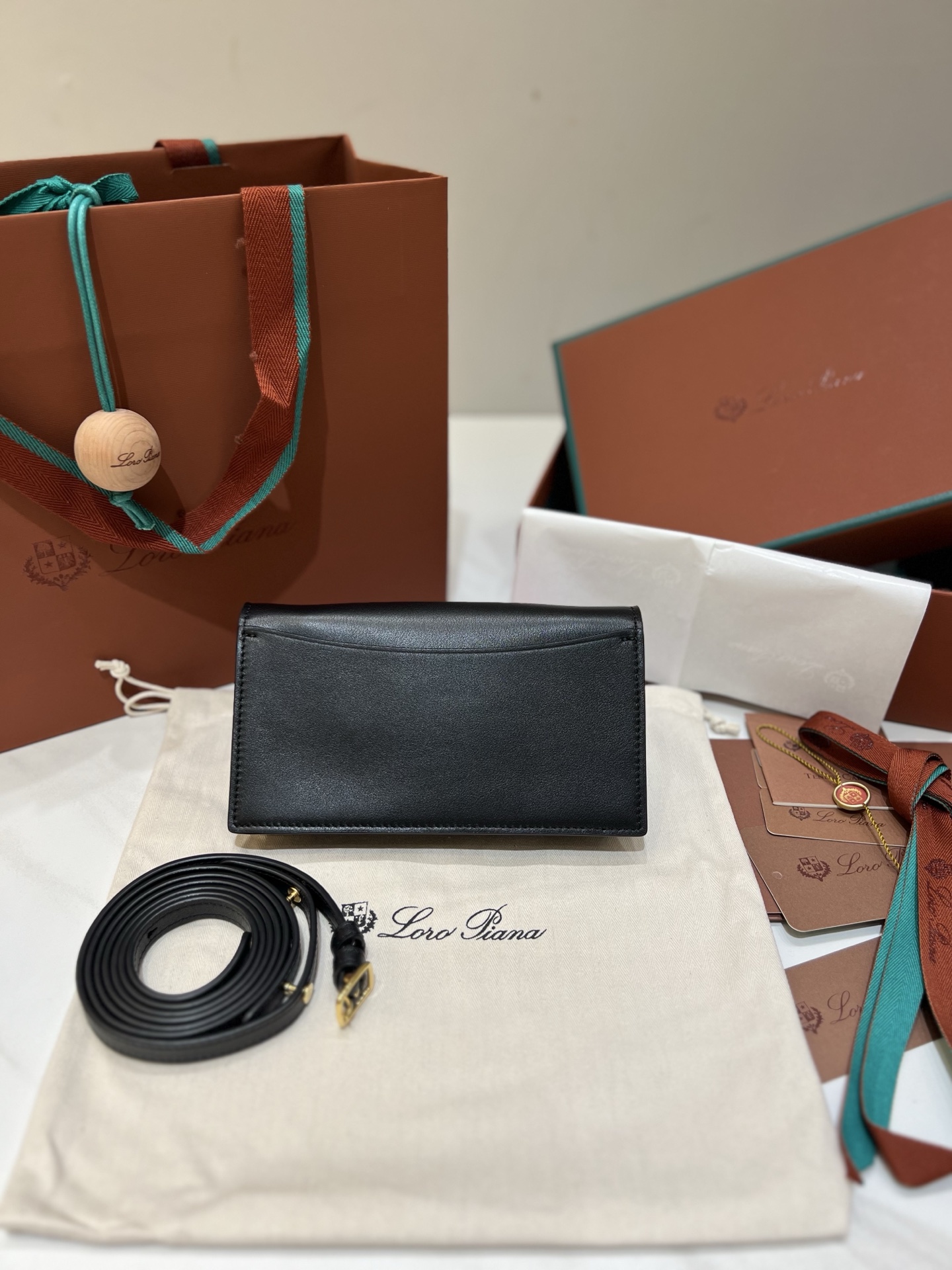 Loro Piana pochette clutch