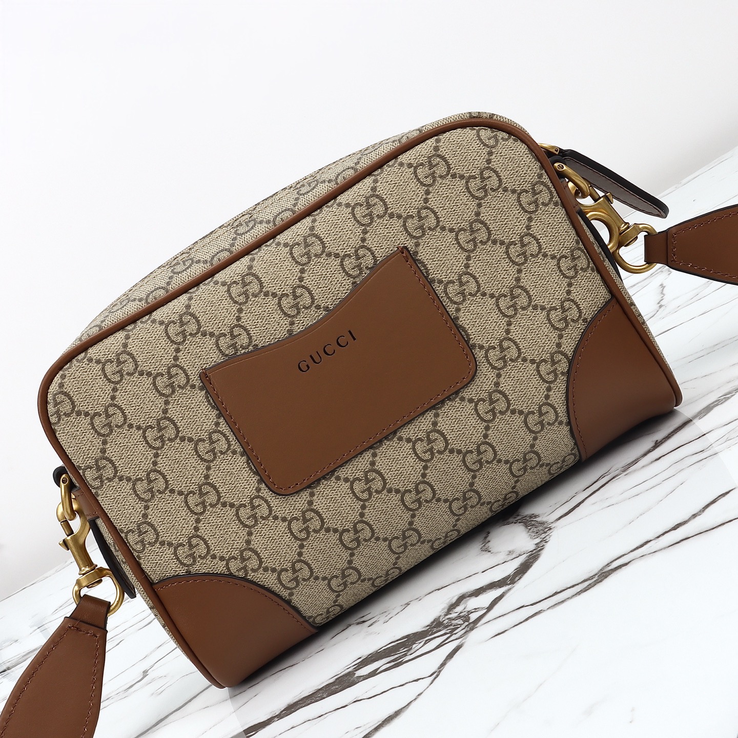 Gucci GG Emblem small crossbody bag 821155