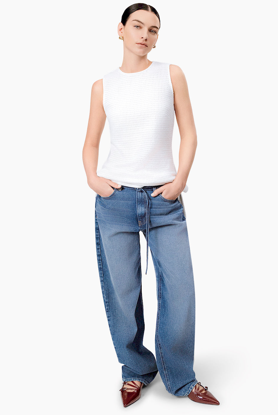 Blusa tejida larga con aberturas
