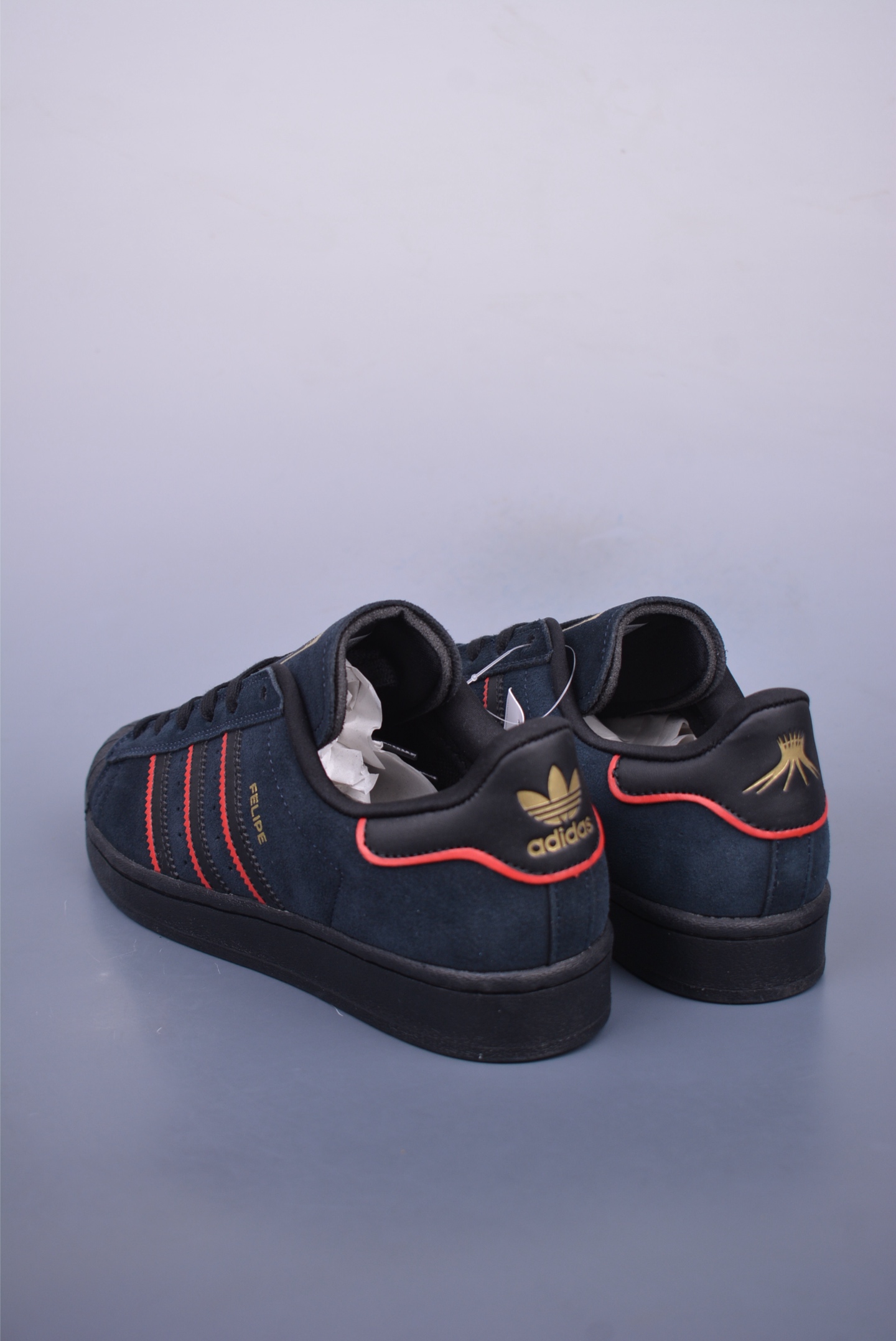Felipe Gustavo x Adidas Superstar ADV sports shoes black, red and gold JR7831
