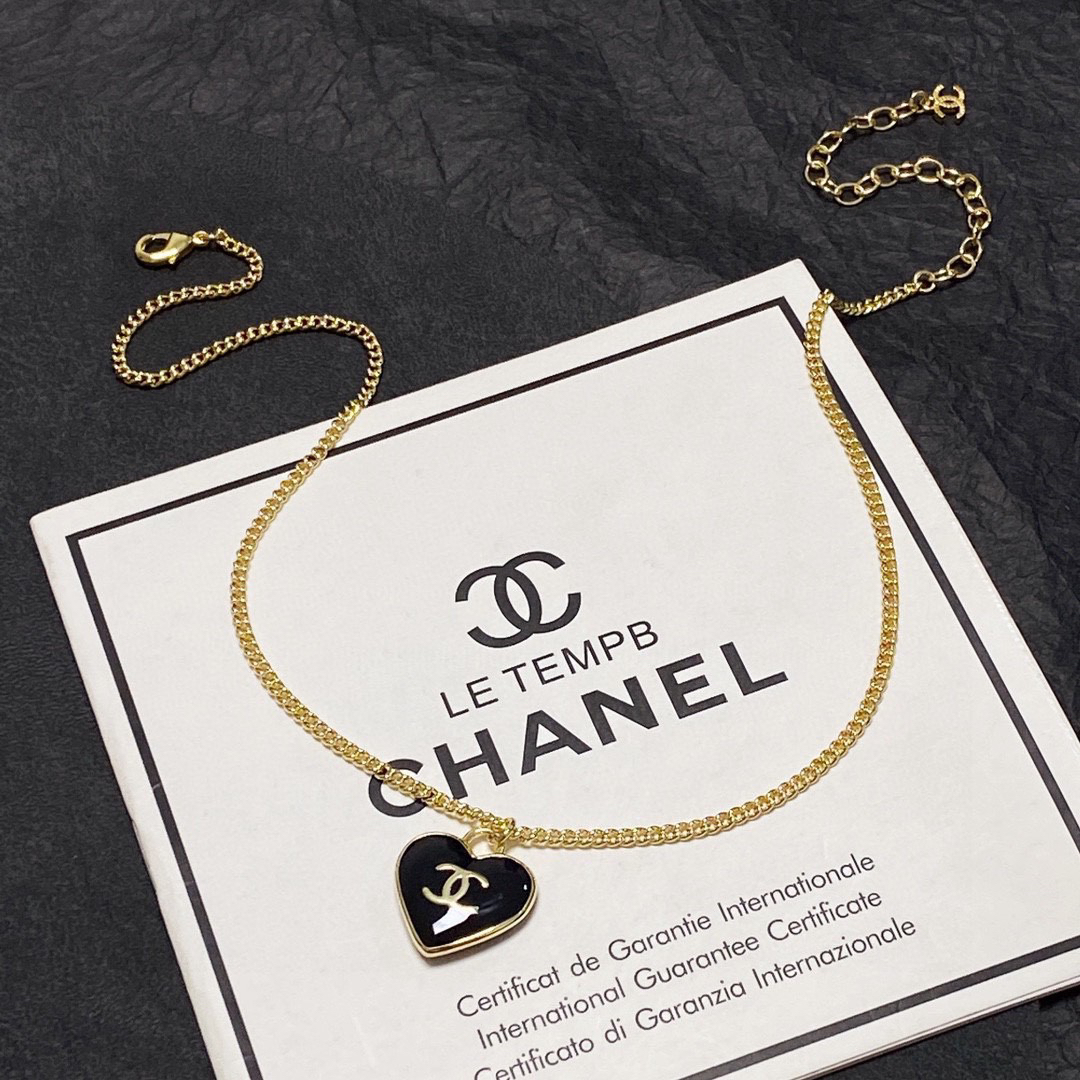 Chanel black heart double-sided necklace