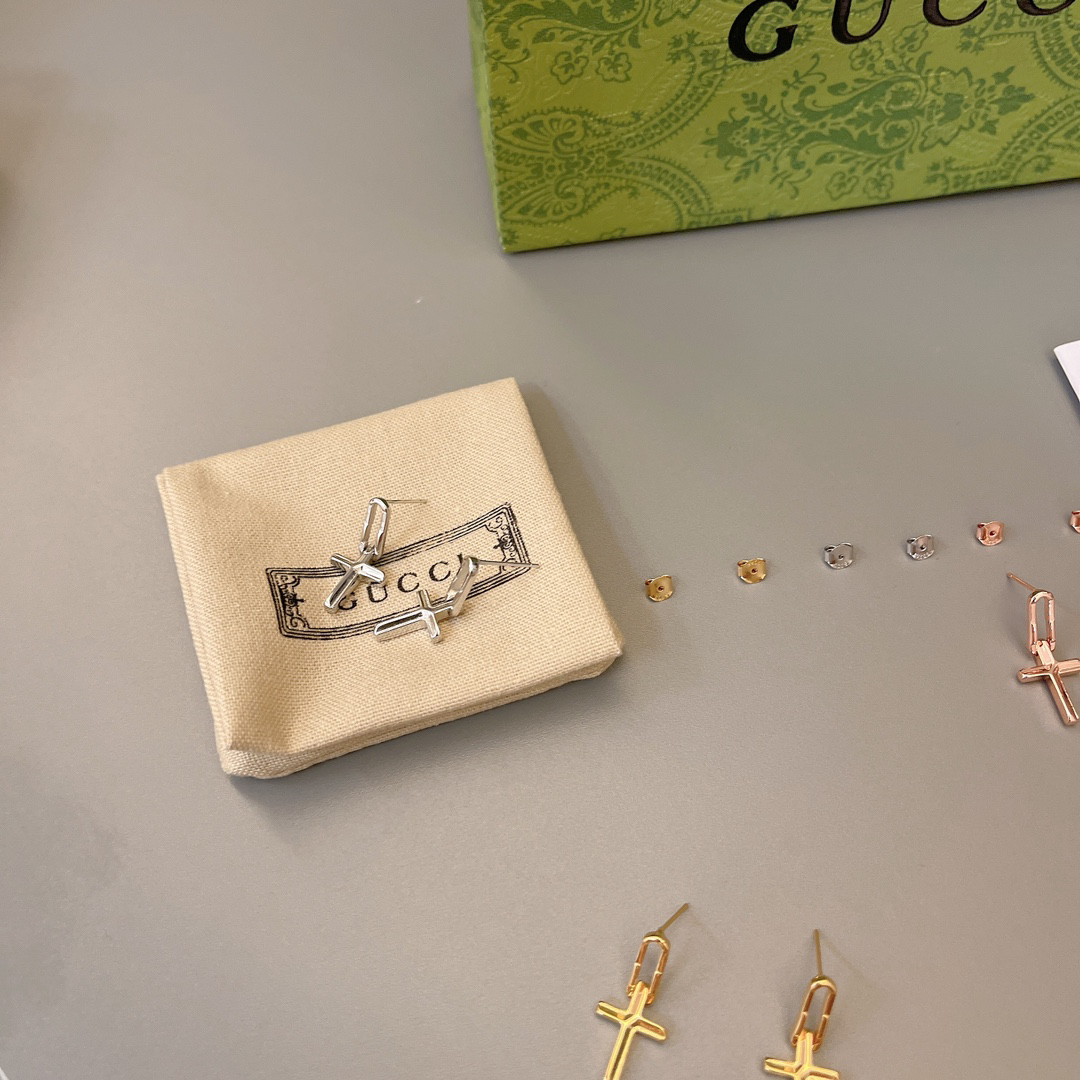 GUCCi cross earrings