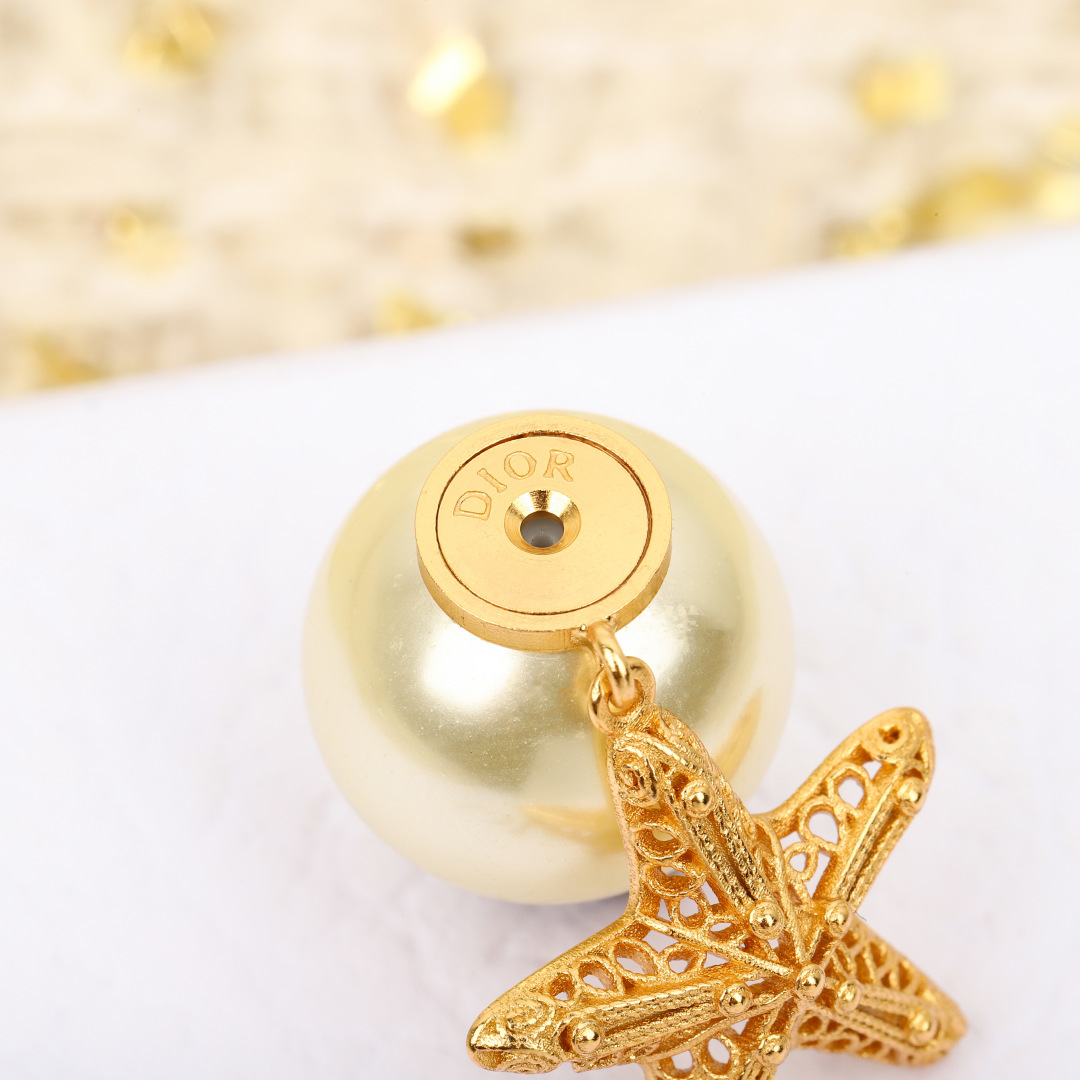 Dior starfish pearl earrings