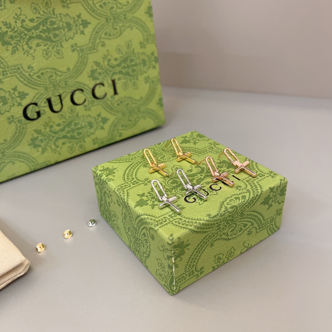 GUCCi cross earrings