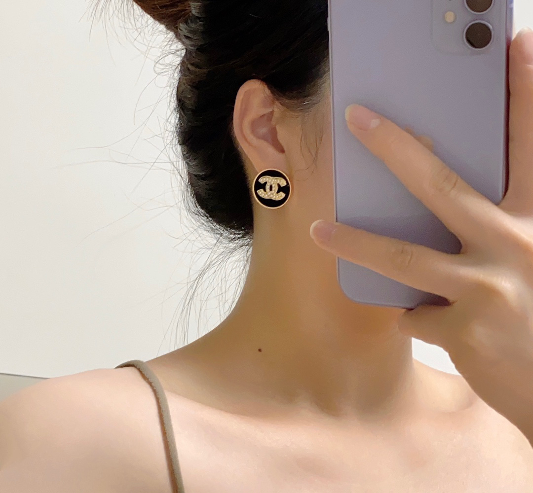 Chanel Apricot and black pearl earrings