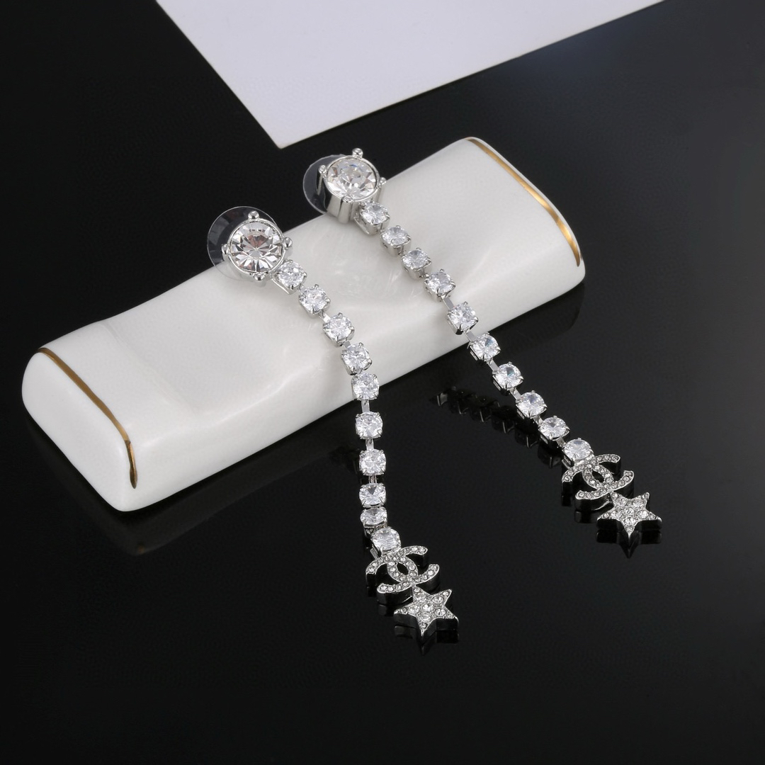 Chanel Star Long Earrings