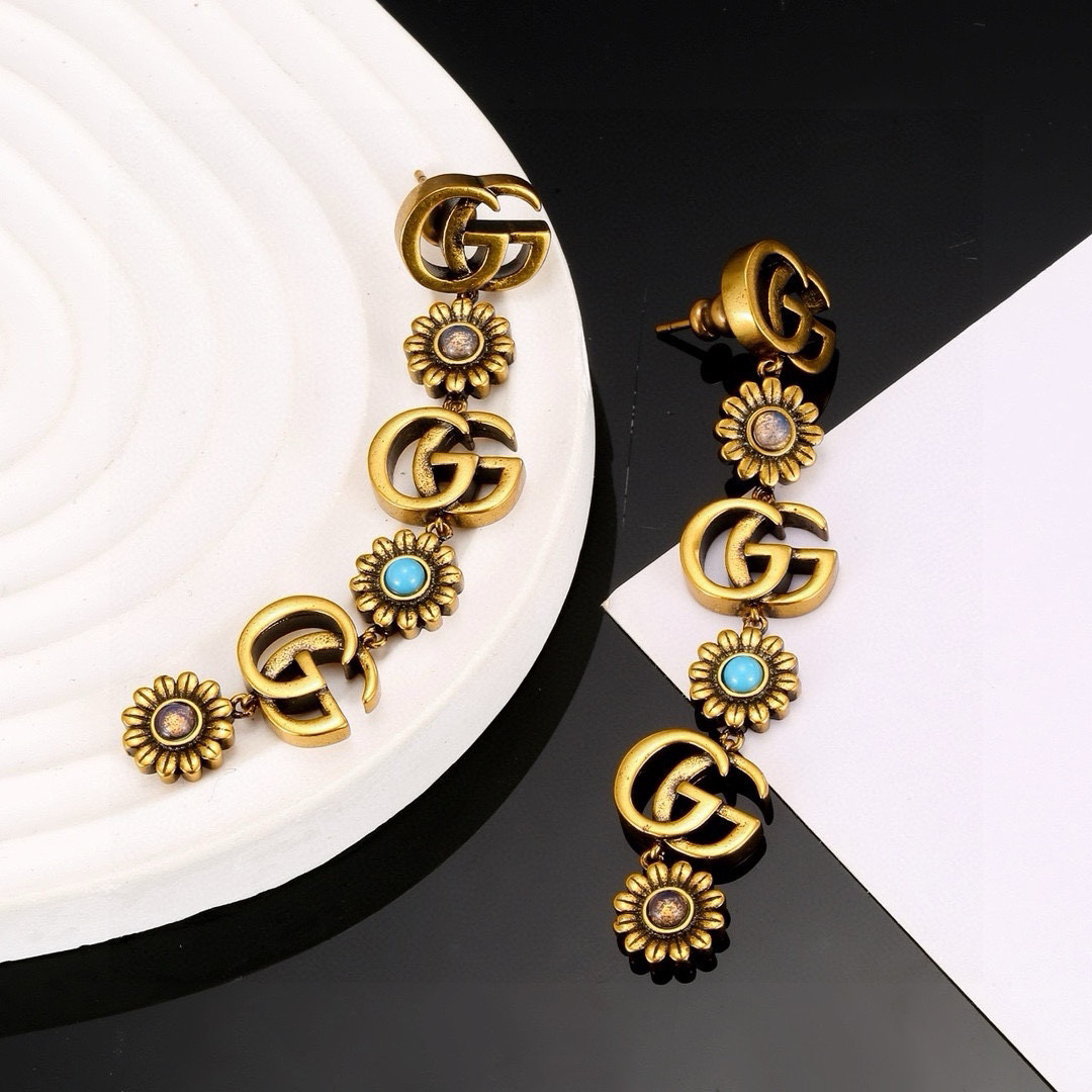 GUCCi distressed chrysanthemum earrings