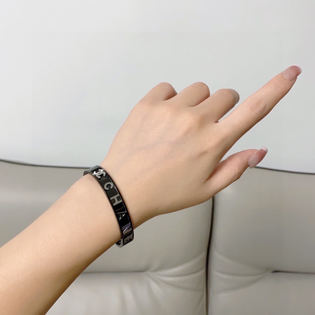 Chanel engraved letter charcoal black bracelet