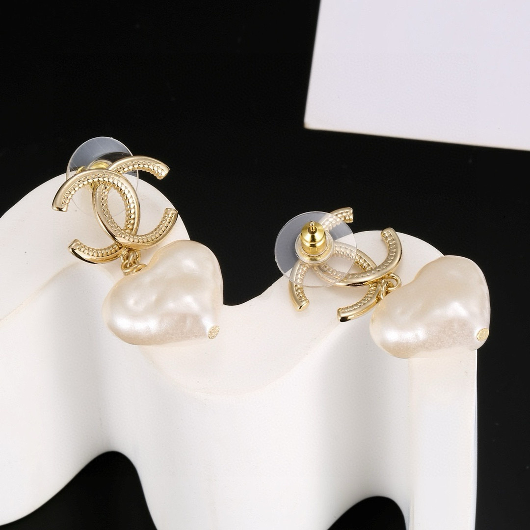 Chanel light gold heart earrings