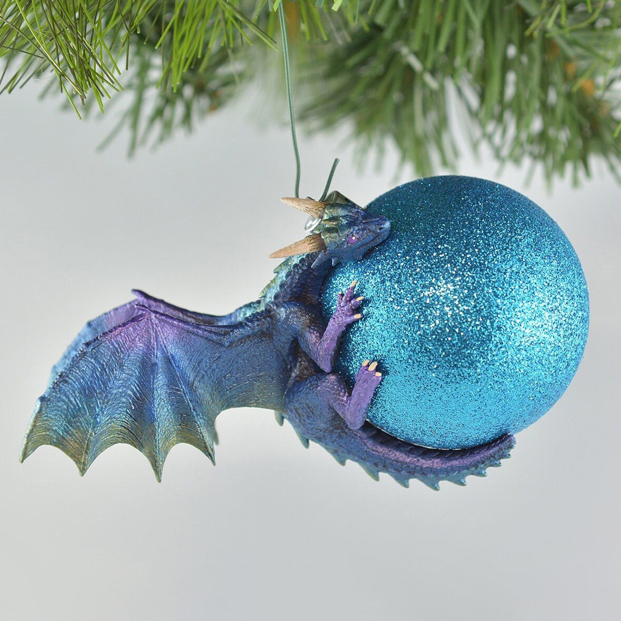 Dragon Bauble Ornament | Dragon hovering over the ball