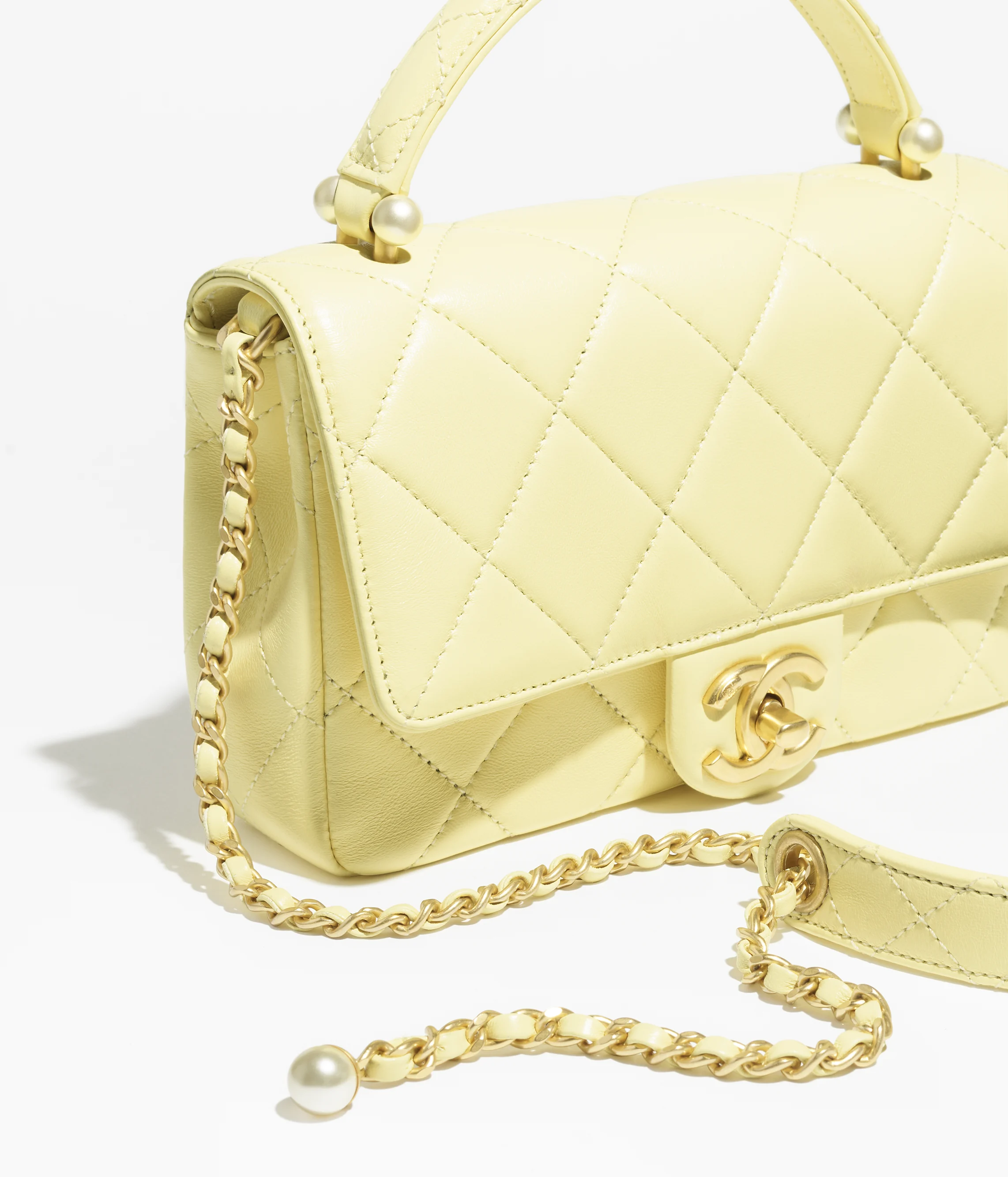 Chanel Mini Flap Bag with Top Handle Shiny Lambskin, Imitation Pearls & Gold-Tone Metal Light Yellow AS5399-B19655-NAAUK