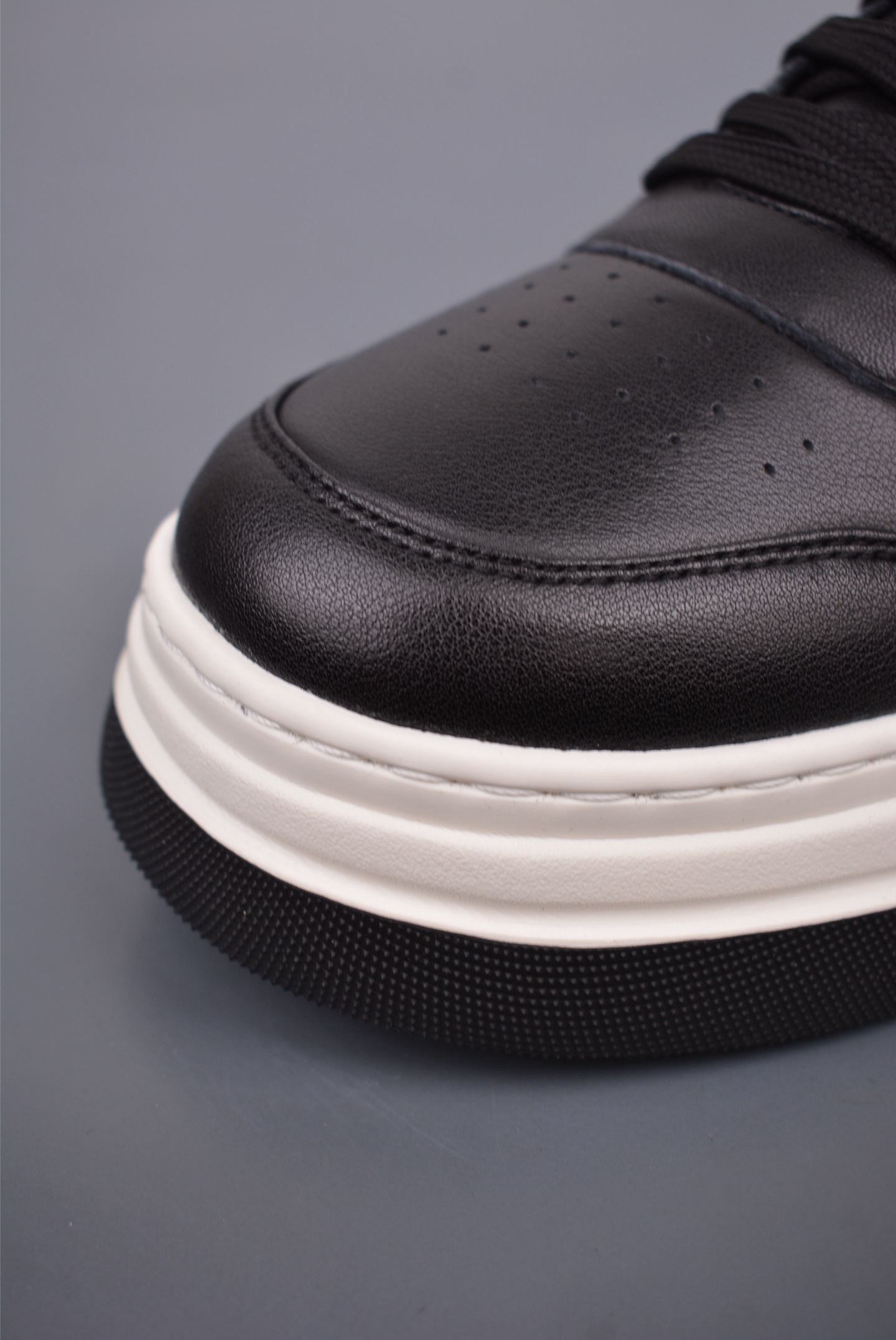 Prada PRAX 01 Triangle Logo Leather Sneakers Black and White D933M_3LF5_FG000