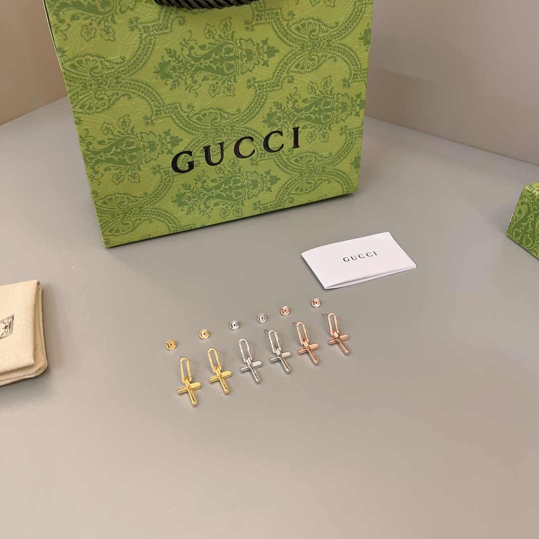 GUCCi cross earrings