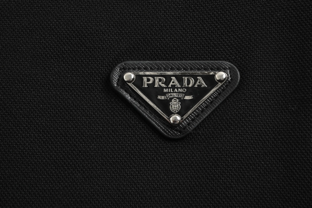 Prada 23Fw triangle logo patchwork suit trousers