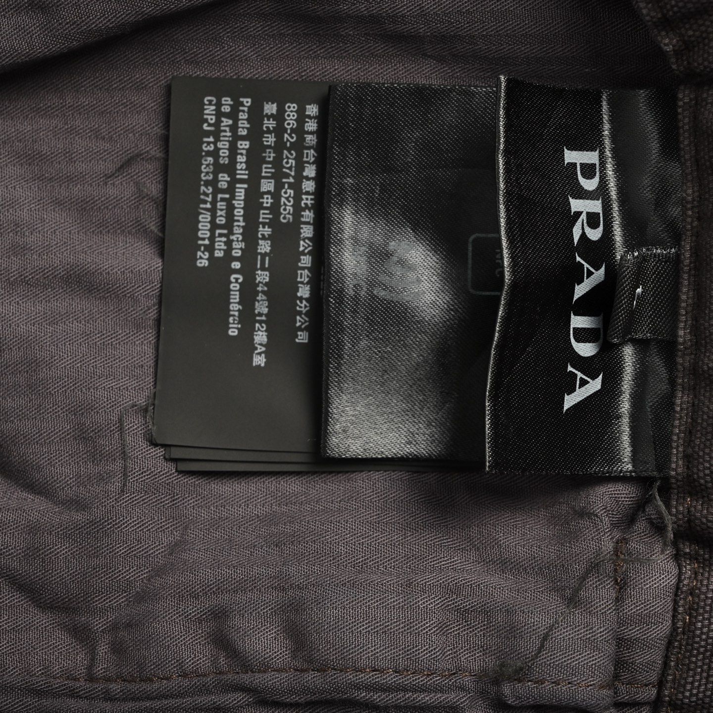 Prada distressed pocket triangle logo overalls