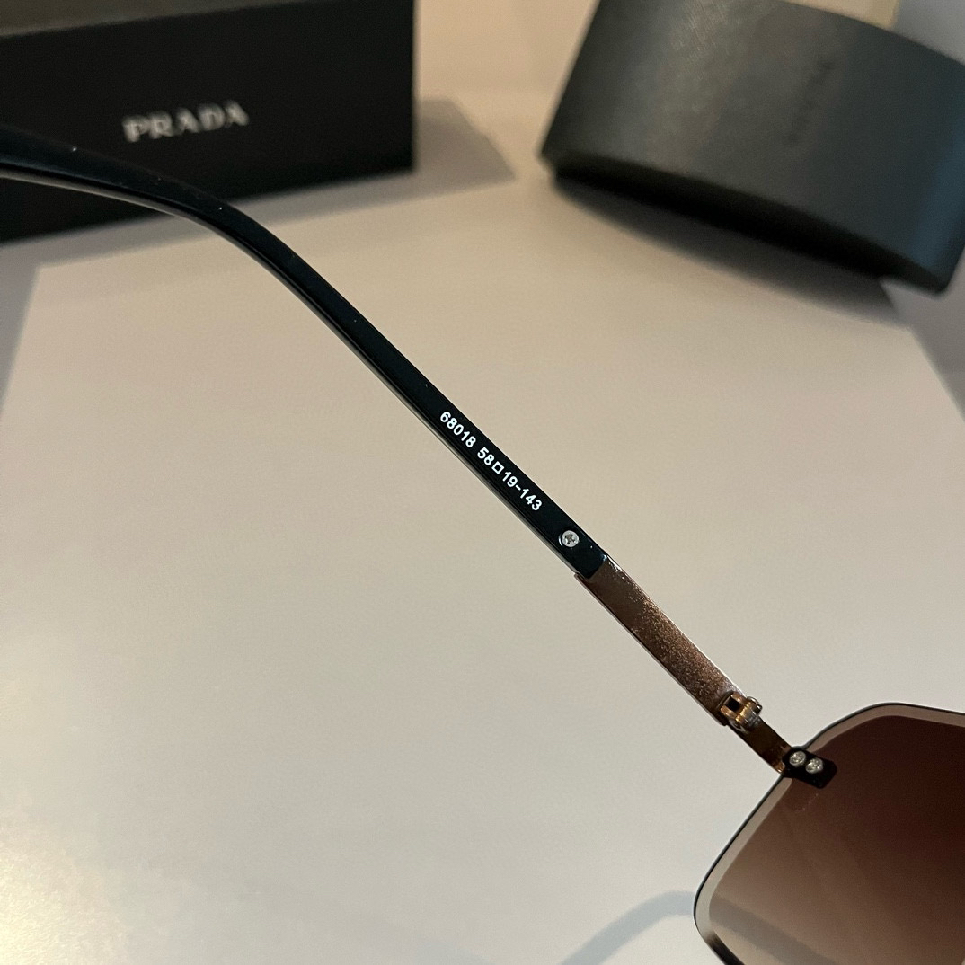 Prada rimless sunglasses