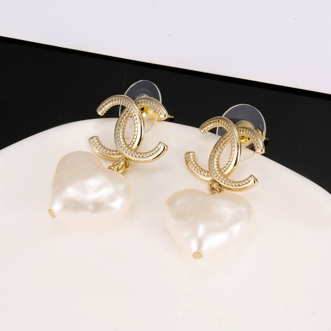 Chanel light gold heart earrings