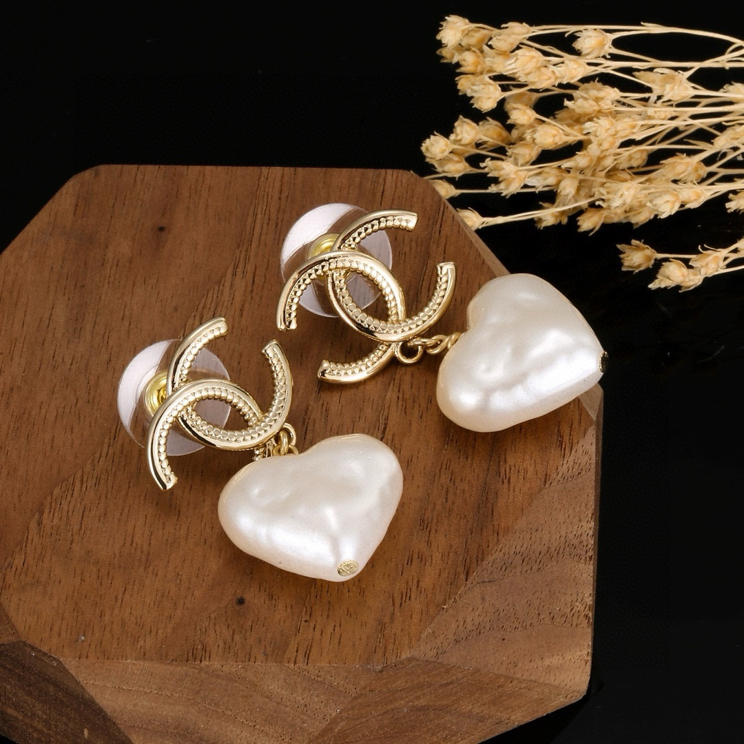 Chanel light gold heart earrings