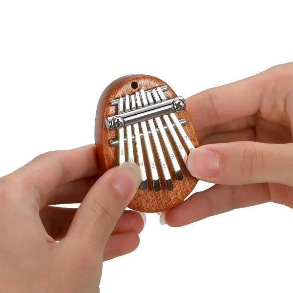 (🔥HOT SALE NOW - SAVE 50% OFF)  8 Keys Mini Kalimba Thumb Piano -BUY 3 FREE SHIPPING